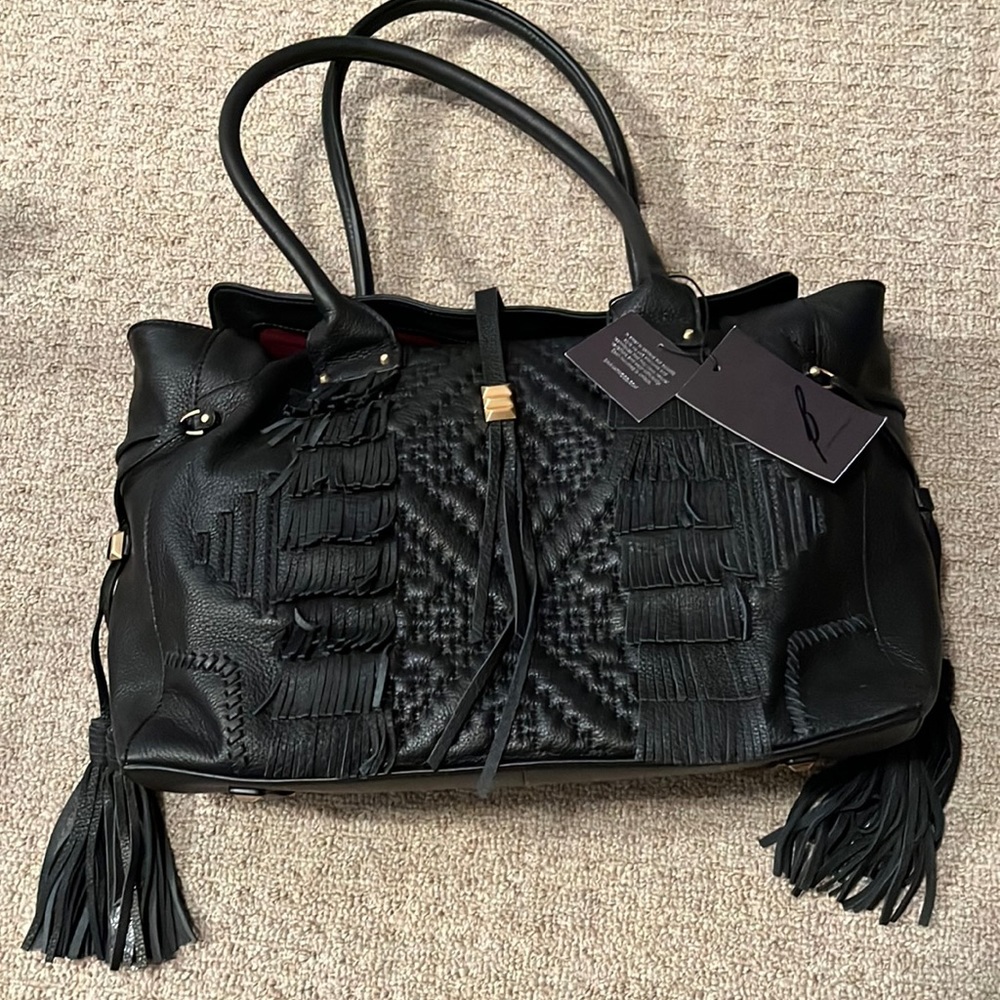 Brand New with tags Brian Atwood black leather handbag.